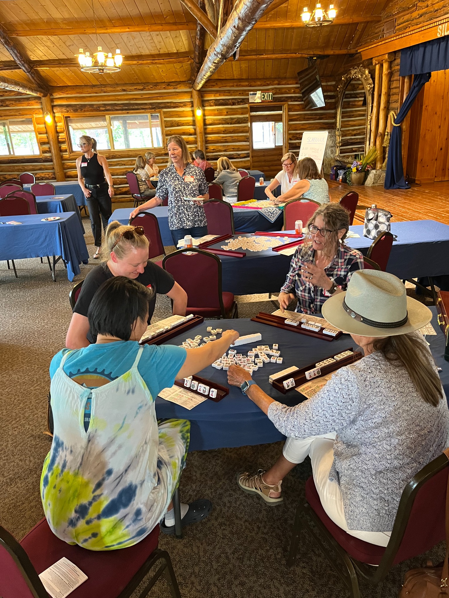 Friendly tables in the log hall